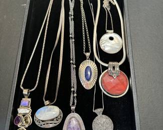 Long sterling chains with sterling pendants with assorted stones