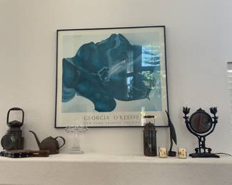 Georgia OKeefe wall art over metal decor