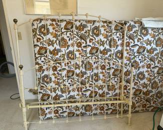 Double Full size iron bed, complete with rails and slats, mattress and box spring in great shape if you want them.