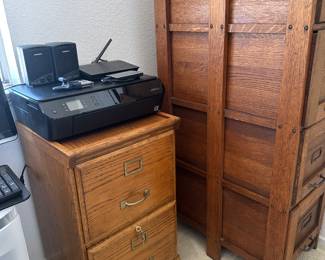 Sides of file cabinet nicely done, two drawer file cabinet, one of three printers