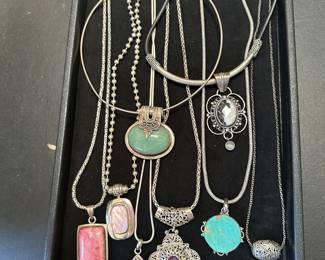 Sterling long chains with sterling and stone pendants. Due to the silver weight of some of these chains we are offering inexpensive chains to go with pendants if you prefer to save, but will keep chains with pendants until they sell with or without