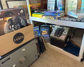 Rotary trays for slide projectors, books, safe that has no key, classical music record sets