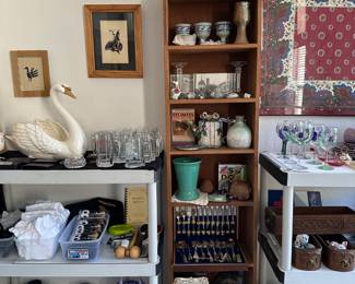 Tall narrow bookshelf, one of many assorted sizes