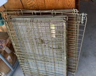 Dog crates, one with bottom, one for use on grass