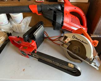 Black and Decker electric blower, Black and Decker electric circular saw, Craftsman mini chain saw