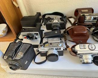 Cameras include Pentax, Canon, Keystone, Kodak Instamatics