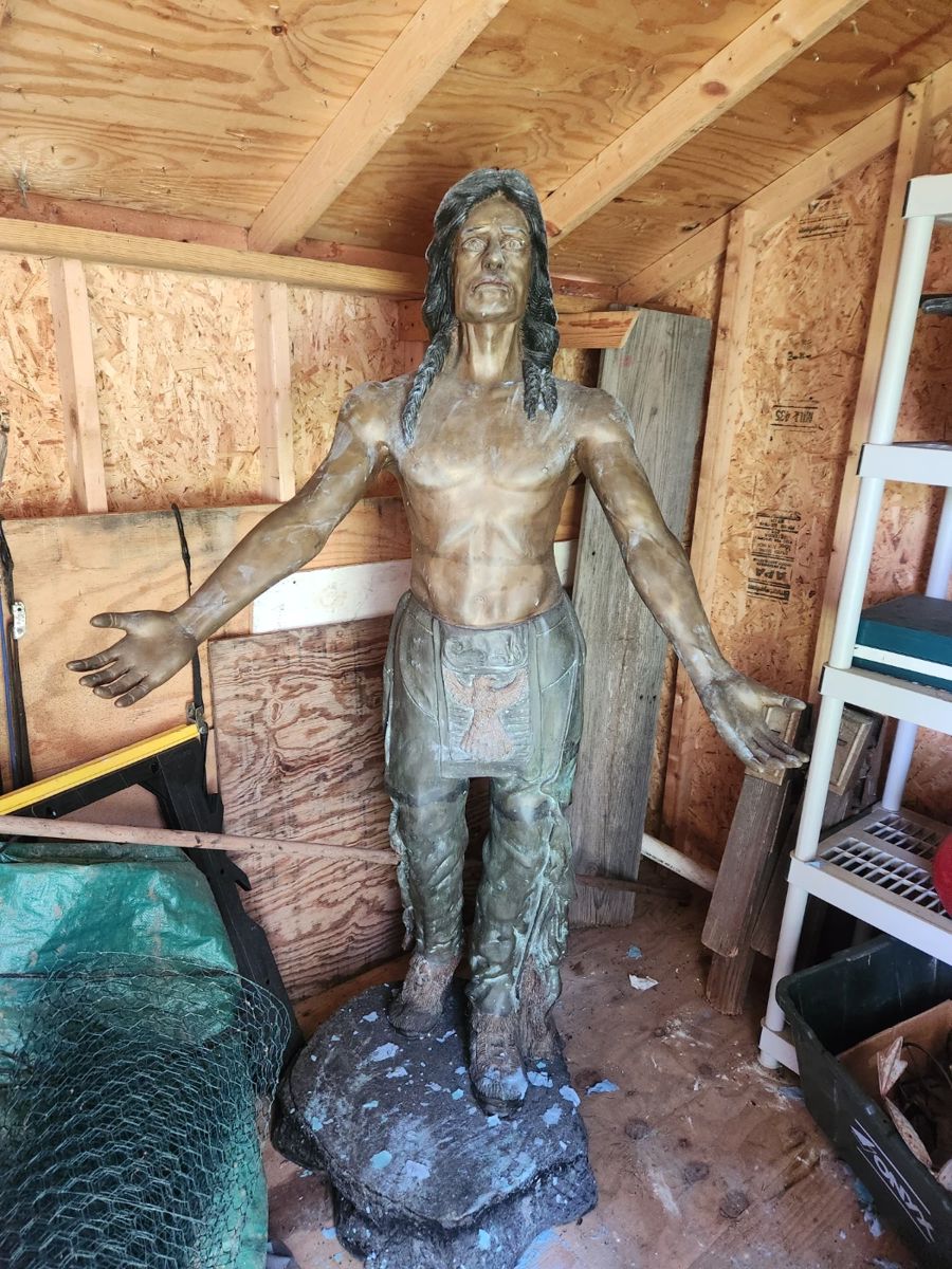 NOT AI. A life size Amercan Indian copper or brass statue.--he's about 6 feet--and now in the house and cleaned up. What a guy!  by E Epple