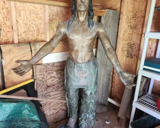 NOT AI. A life size Amercan Indian copper or brass statue.