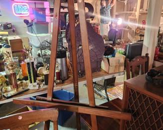 Easel with all the goodies in the basement--filled to the brim