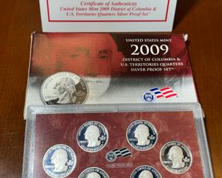 six piece silver collectible US quarter set.
key date 2009 series depicting the US territories