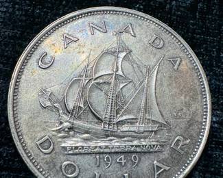 1949 silver Canadian dollar coin in uncirculated condition