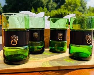mid-century modern emerald green glass tumblers with leather and brass lion head removable wrap.