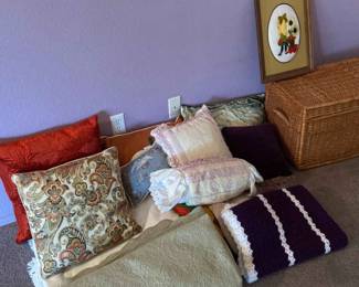 Blankets, Afghans, Pillows, And A Wicker Chest 
