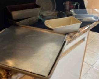 Cookie Sheets, Bread, Pans, Pyrex Pie Dish And Measuring Cup