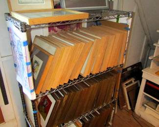 Hundreds of framed Noel Spangler prints