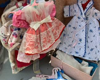 vintage doll box and doll clothes. we also have vintage dolls