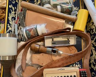 set of tools and materials for leather embossing and metal work