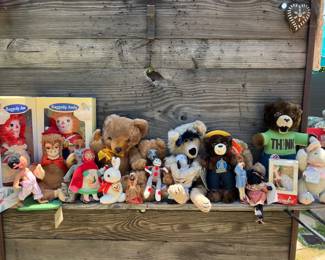 all vintage in perfect condition never used with tags vintage " Character" 11" Mohair Monkey, vintage annalen dolls, vintage Shanghai dolls factory plush bunny ",smokey the bear dolls, vintage Mamie dolls, raggedyann and Andy dolls all in never used condition.tons more at sale.