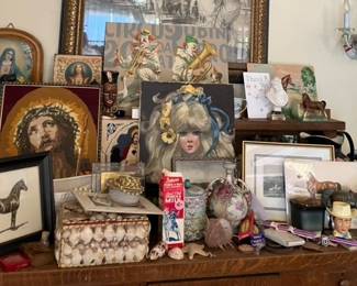 mix of artwork some original horse drawings some framed vintage prints, paint by number clowns , needlepoint Jesus, shell boxes , vintage glasswear, roy rogers vintage cup, vintage brass horse, ceramic Jesus, ceramic horse vase. more to come..