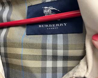 Lots of high end name brand clothing Burberry