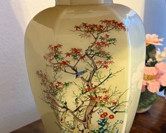 Thus Asian vase is in perfect shape with the original and labels silk shade