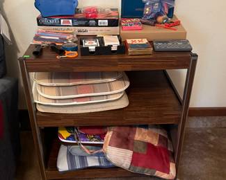 Rolling yea cart. Stationary shelves
