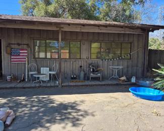 HUGE garage workshop with great covered porch.