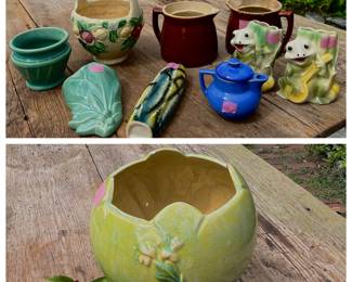 Lots of colorful pottery items. Some McCoy and Roseville as well as handmade artisan pieces. Vases, cups, wall pockets, planters and pitchers.
