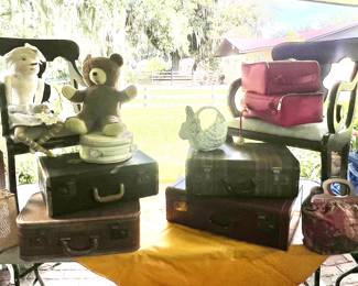 Great assortment of vintage luggage.