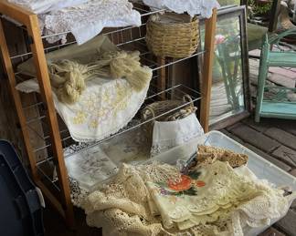LOTS of linens - table cloths, and much more
