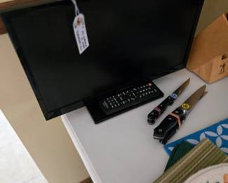 Sharp TV with remote. 