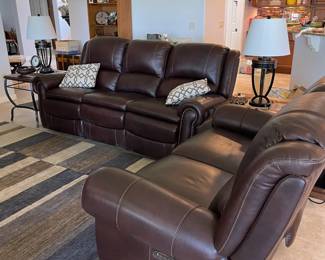 Sofa and Loveseat - Havertys.  Four reclining seats in this set.  Lumbar and neck adjustments and plug in for your charging needs.