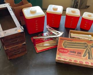 1950s canisters - time worn but cute to look at!  Cookie gun and fry maker look like fun!