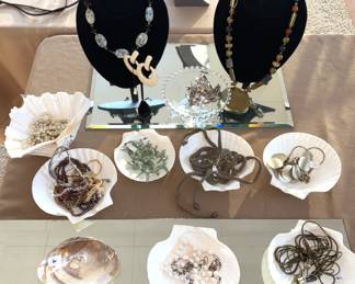 Large amount of costume jewelry. Some Sterling and finer gold items.