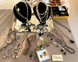 Large amount of costume jewelry. Some Sterling and finer gold items.