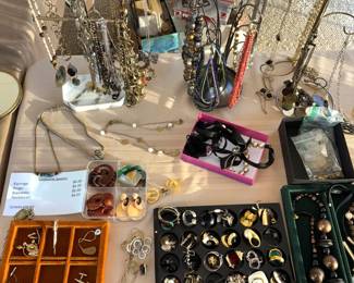 Large amount of costume jewelry. Some Sterling and finer gold items.