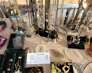 Large amount of costume jewelry. Some Sterling and finer gold items.