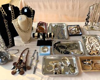 Large amount of costume jewelry. Some Sterling and finer gold items.