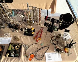 Large amount of costume jewelry. Some Sterling and finer gold items.