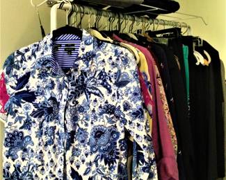There are 5 packed racks of designer clothes!