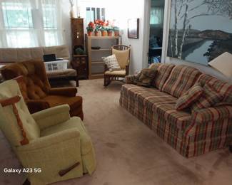 LaZBoy couch, vintage recliners, book shelf, wall art, rocking chair, skinny cabinet