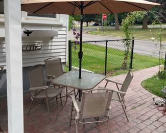 patio table chairs and umbrella