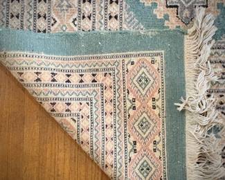 Green oriental rug
