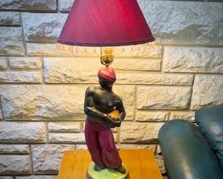 Mid-century chalk ware blackamoor dancing figure lamps
