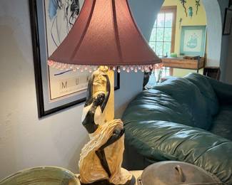 Mid-century chalk ware blackamoor dancing figure lamps