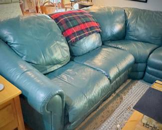 Green leather L-shaped sofa