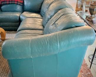 Green leather L-shaped sofa
