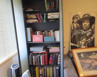 Books including literature, framed Jimi Hendrix poster