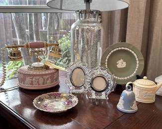 Wedgewood collectibles and Lamp and Waterford Frames.