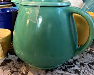 Vintage 1930's Fiesta Ware pitcher with lid.